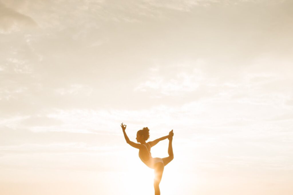 woman in standing yoga position